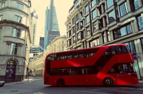 red shuttle bus on the street