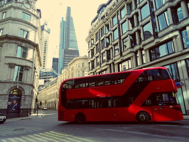 red shuttle bus on the street